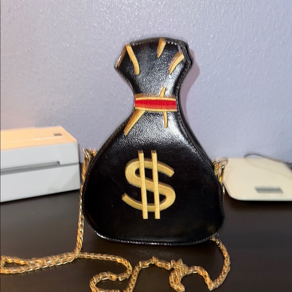 Black Crossbody Bag with Gold Dollar Emblem